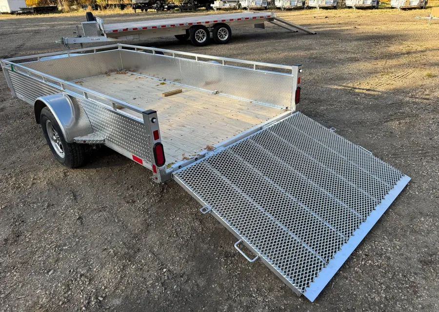 Enbeck aluminum utility trailer with the mesh ramp gate folded down